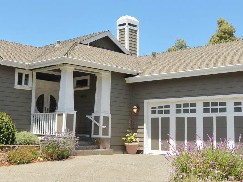 Weatherguard Roofing & Restoration | Fresh paint on a home's exterior after a new roof installation