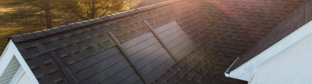 Roof With Solar Shingles At Dawn